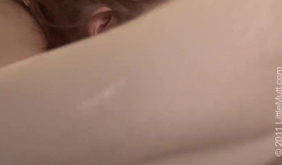 Nice schoolgirls use a pink strap-on in their hot sex