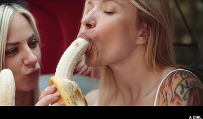 Four lesbian beauties eat bananas and have fun together