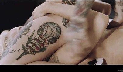 Inked babes Elsa Jean & Joanna Angel having passionate sex