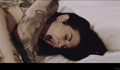 Blonde lesbian enjoying sex with her brunette girlfriend