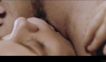 Blonde lesbian enjoying sex with her brunette girlfriend