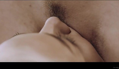 Blonde lesbian enjoying sex with her brunette girlfriend