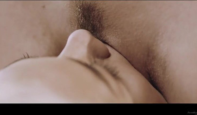 Blonde lesbian enjoying sex with her brunette girlfriend