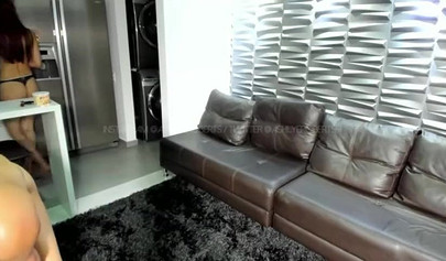 Naked chicks posing on a balcony overlooking the city