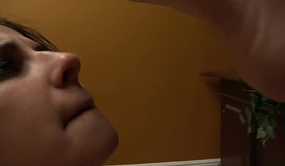 Beautiful business lady makes a nice worker sniff her feet