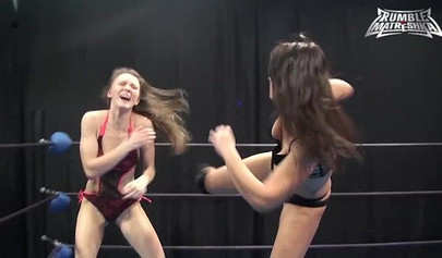 Blonde vs brunette - woman wrestling with beauties