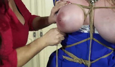 Busty MILF tied up and gagged by a horny mistress