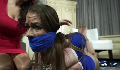 Busty MILF tied up and gagged by a horny mistress