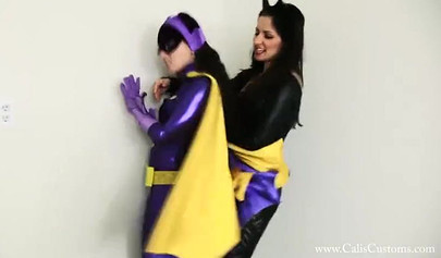 Batwoman was stripped and spanked by Catwoman