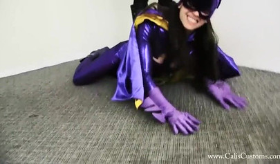 Batwoman was stripped and spanked by Catwoman