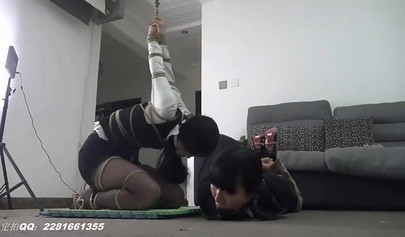 Bondage porn video with tied up Asian girls on the floor
