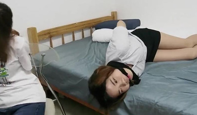 Asian bondage with cute submissive babe on the bed