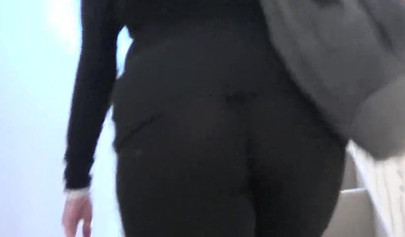 Busty blonde satisfies a tied up brunette on the bed