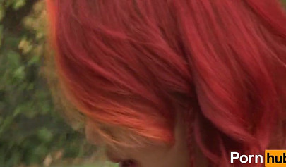 Redhead babe has lesbian sex with a brunette on a tennis court