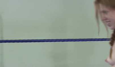 Amazing naked girls fighting with a purple dildo in the ring