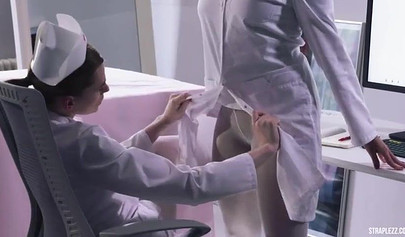 Slutty nurses sniff feet in pantyhose and enjoy a strap-on