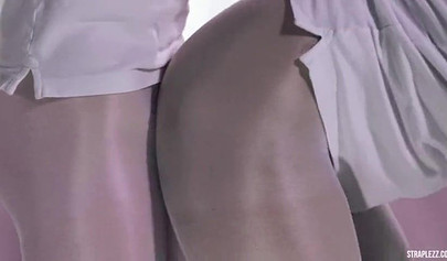 Slutty nurses sniff feet in pantyhose and enjoy a strap-on