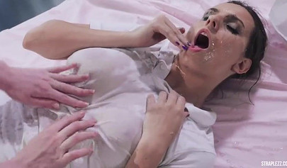 Slutty nurses sniff feet in pantyhose and enjoy a strap-on