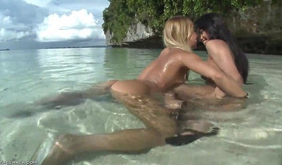 Nikky Thorne & Nomi Melone are having romantic lesbian sex in the sea