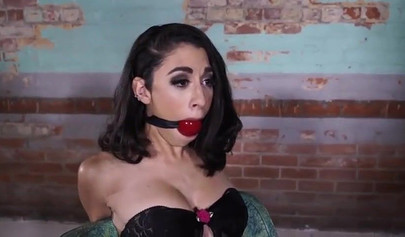 Horny brunette with huge tits was tied up and gagged
