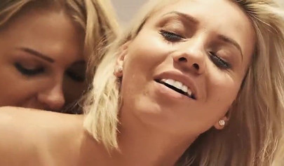 Lucy Heart and Vicky Love enjoying romantic sex on the bed