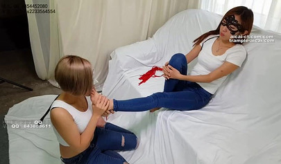 Chinese foot worship with horny lesbians in blue jeans