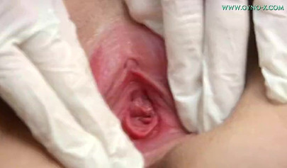 Sweet brunette loves pussy examination in the gynecologist's office