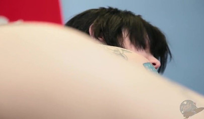 Tattooed ladies fingering each other on office desk