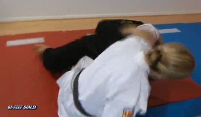 Japanese lady shows blonde babe karate techniques