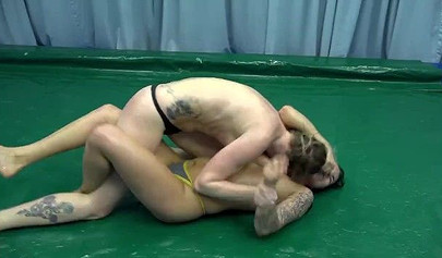 Tattooed girls in sexy panties are fighting in the ring