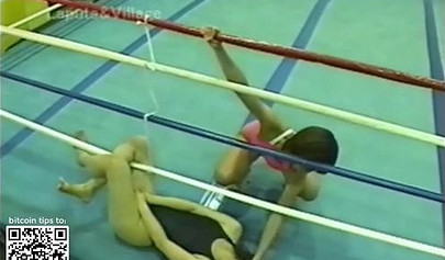 Japanese cougars in bikinis take part in a catfight