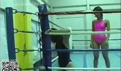 Japanese cougars in bikinis take part in a catfight