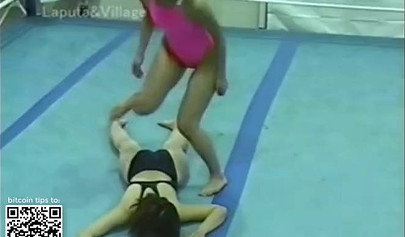Japanese cougars in bikinis take part in a catfight