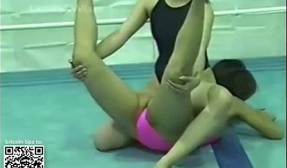 Japanese cougars in bikinis take part in a catfight