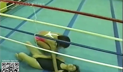 Japanese cougars in bikinis take part in a catfight