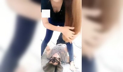 Chinese girl makes her masked slave lick her toes in homemade video