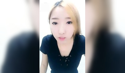 Chinese girl makes her masked slave lick her toes in homemade video