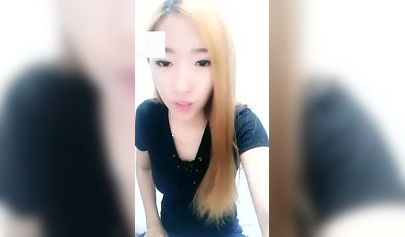 Chinese girl makes her masked slave lick her toes in homemade video