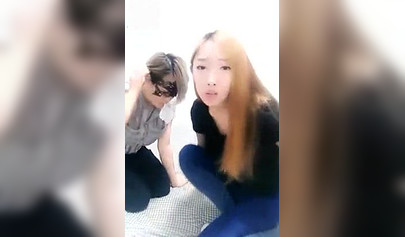 Chinese girl makes her masked slave lick her toes in homemade video