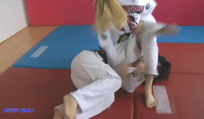 Hot girls fight during a karate and show their strength