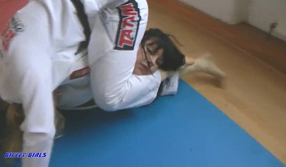 Hot girls fight during a karate and show their strength
