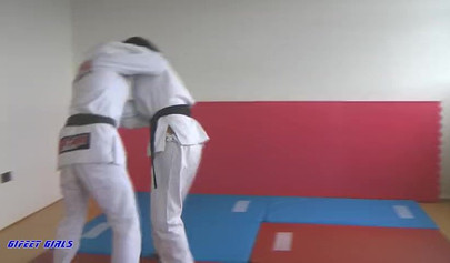 Hot girls fight during a karate and show their strength