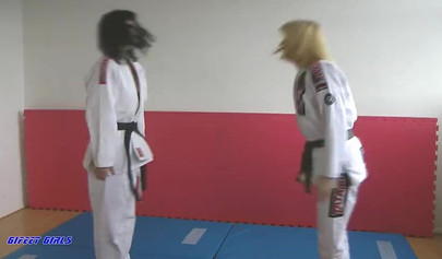 Hot girls fight during a karate and show their strength