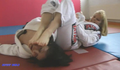 Hot girls fight during a karate and show their strength