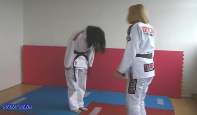 Hot girls fight during a karate and show their strength