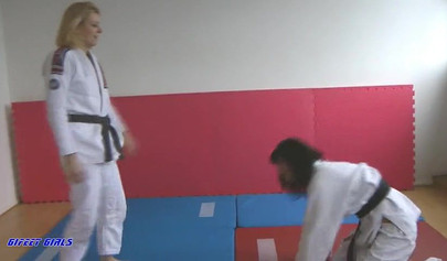 Hot girls fight during a karate and show their strength
