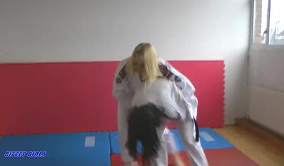 Hot girls fight during a karate and show their strength
