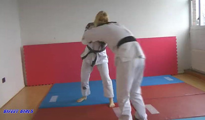 Hot girls fight during a karate and show their strength